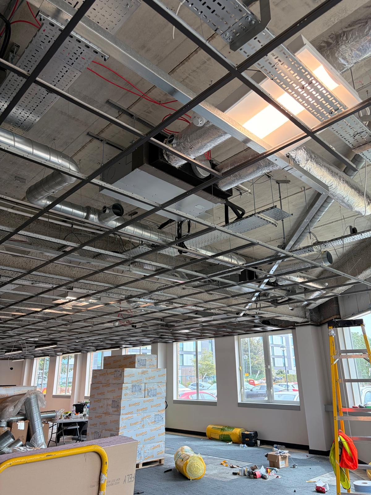 Office fit-out — ceiling grid and spiral ductwork